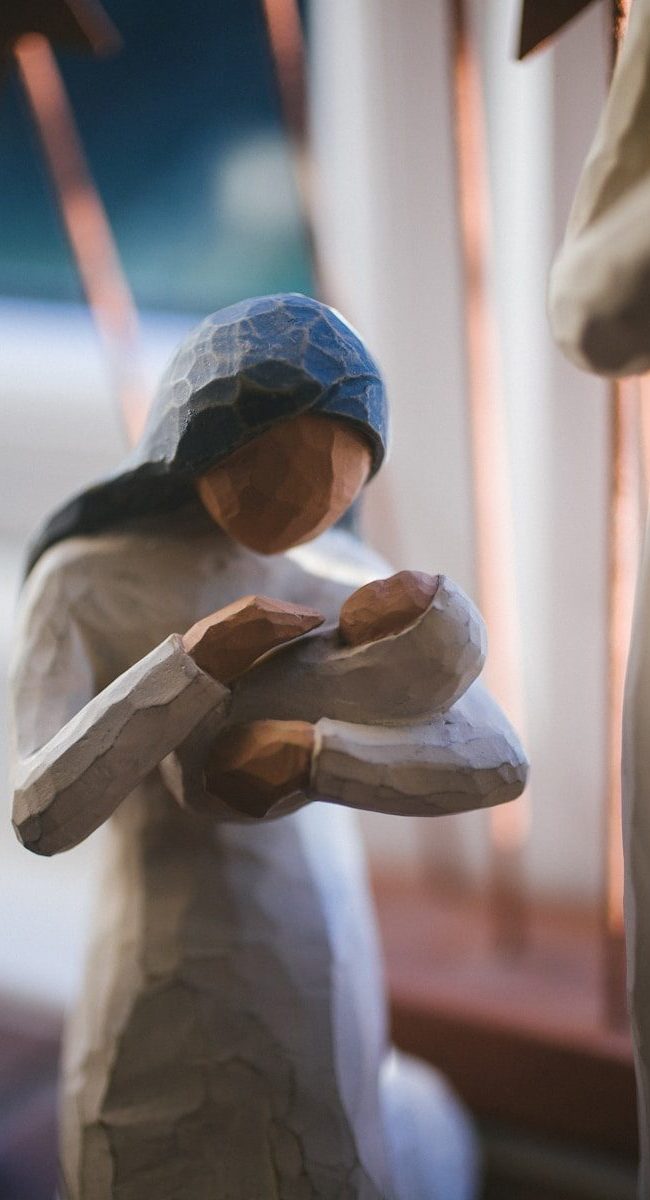 Willow Tree woman carrying baby figurine