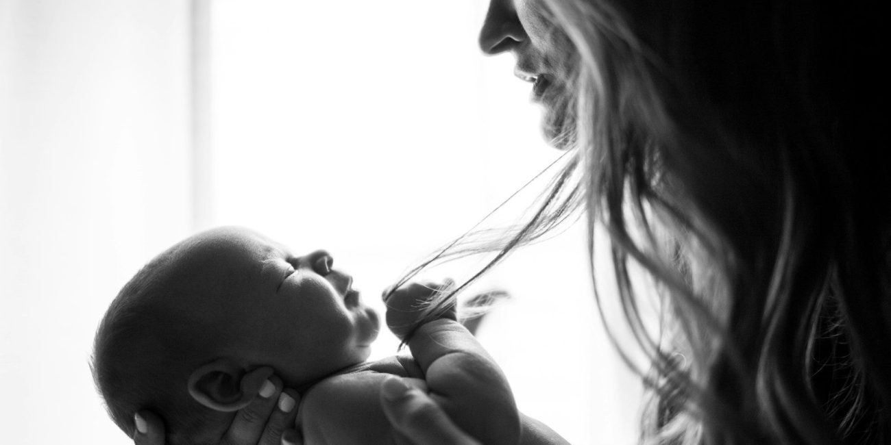 woman holding baby